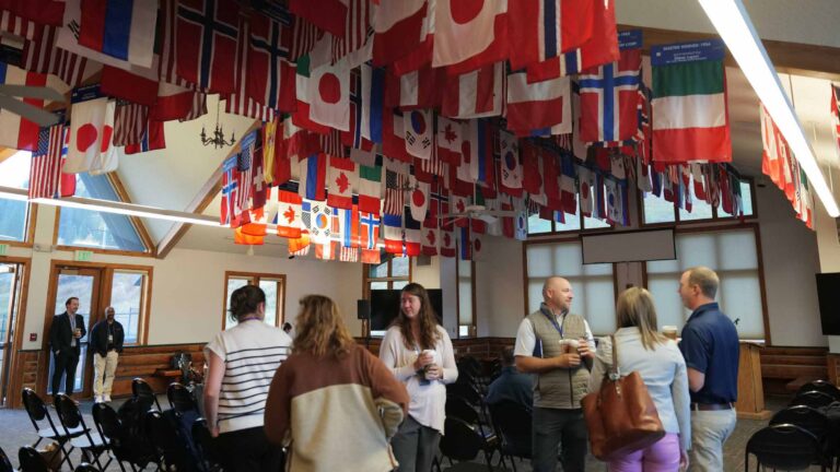 Guests arrive at Olympian Hall for the first day of the Summit.