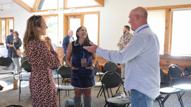 Dr. Scheer greets attendees as the Summit gets underway.