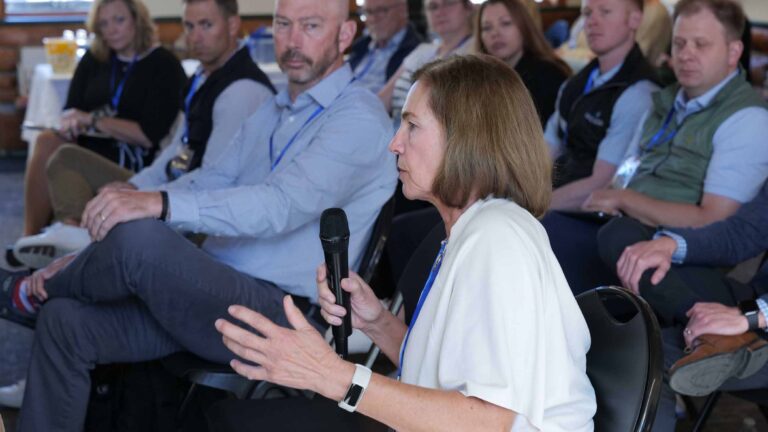 Dr. Patrice Michaletz-Onody engages with the AI panel during audience Q&A.