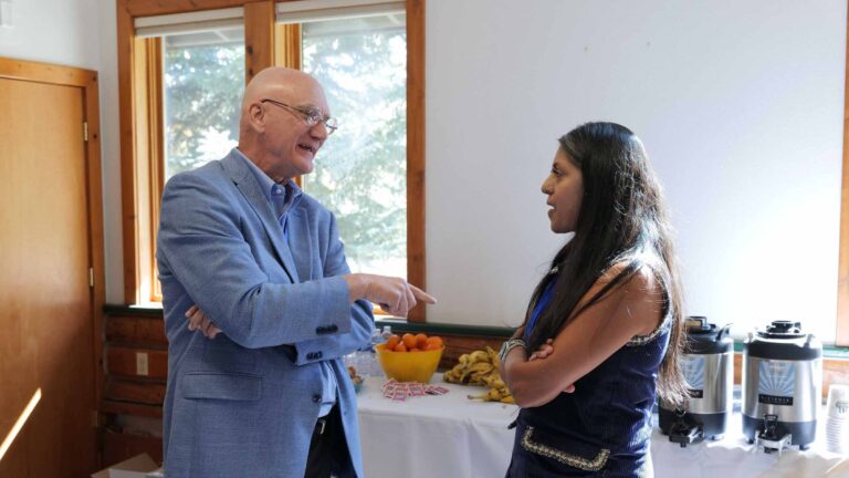 Ron Kubit connects with Soniya Fidler, CEO of Yampa Valley Medical Center, during a Summit break.