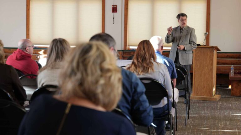 Bruce Loeffler addresses the crowd at the 2025 Summit.