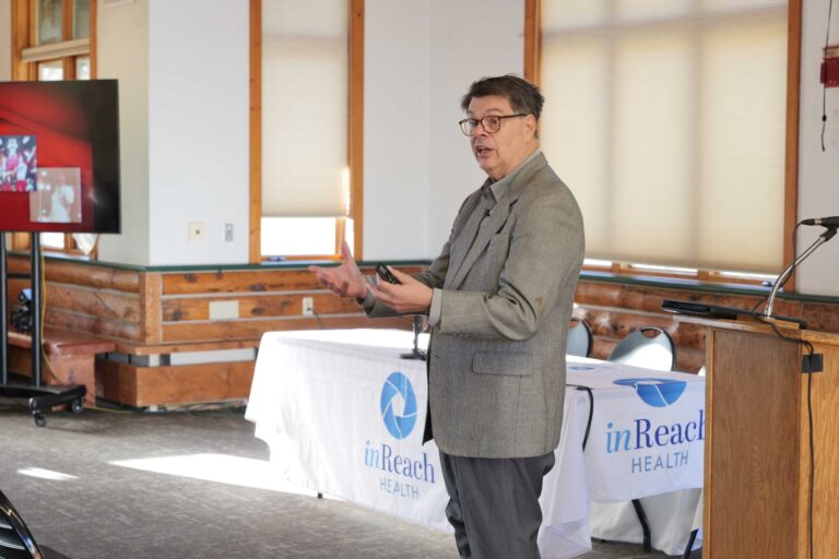 Bruce Loeffler, Chief Experience Officer at Experience International, addresses the audience during his talk on creating a lasting experience in rural health at the 2025 Summit.